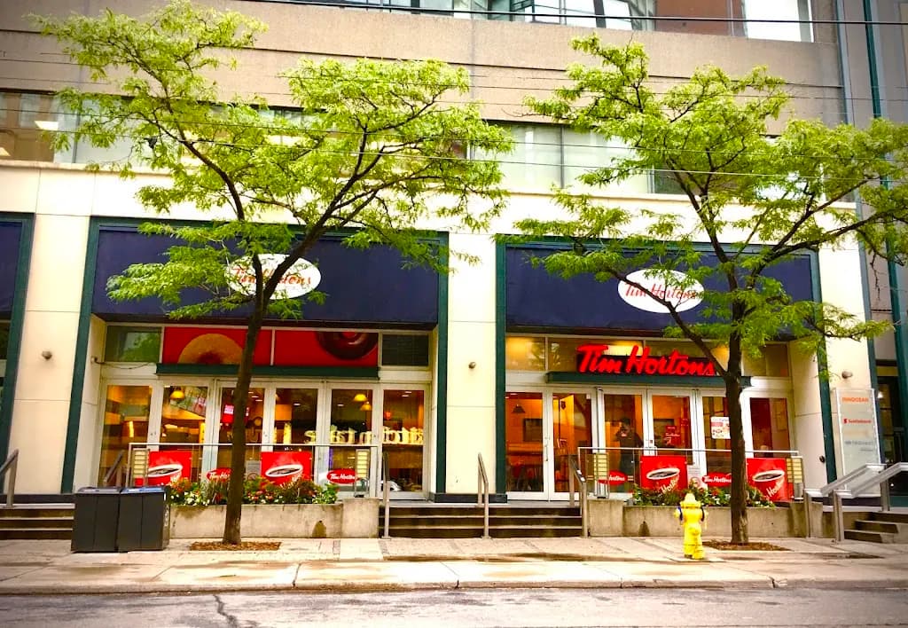 Tim Hortons storefront and interior at 720 King St West, Toronto, ON