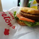 Tim Hortons storefront and interior at 726 Bloor St West, Toronto, ON