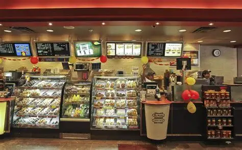 Tim Hortons storefront and interior at 743 Pape Ave, Toronto, ON