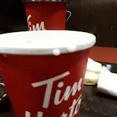 Tim Hortons storefront and interior at 750 Dundas St West, Toronto, ON