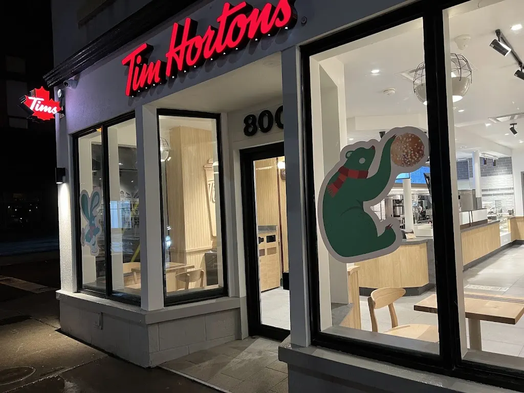 Tim Hortons storefront and interior at 800 Queen St E, Toronto, ON