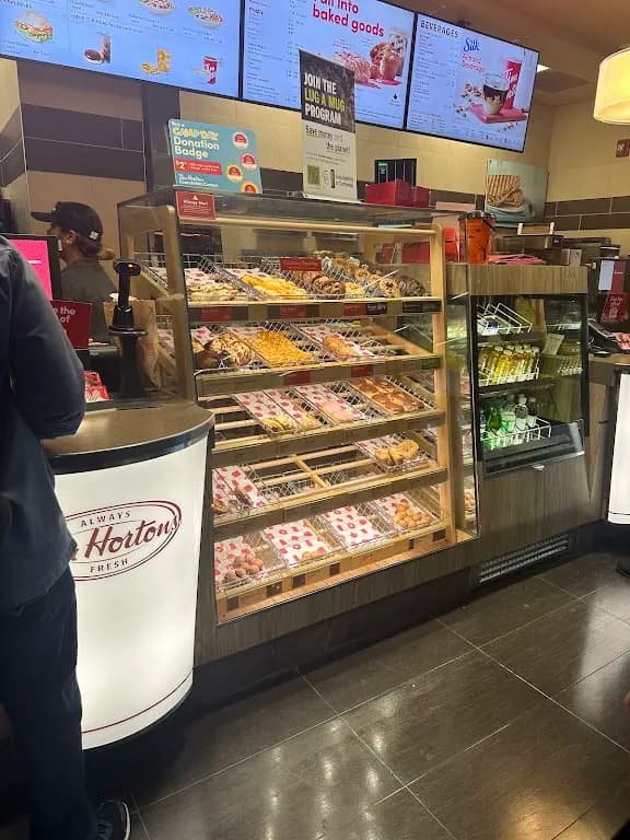Tim Hortons storefront and interior at 941 Progress Ave, Toronto, ON