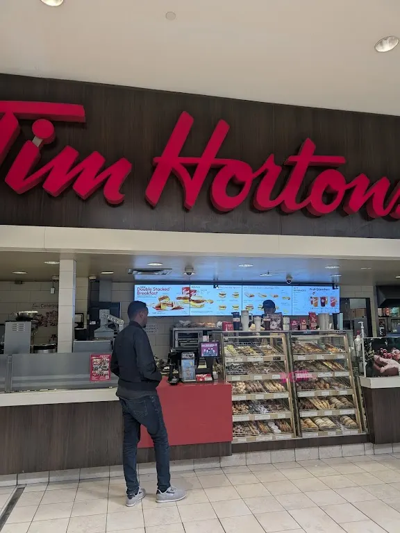 Tim Hortons storefront and interior at 1728 Bloor St West, Toronto, ON