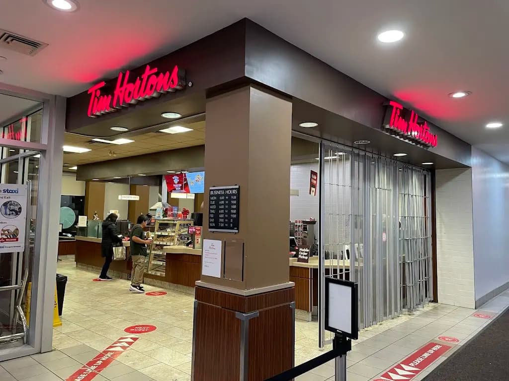 Tim Hortons storefront and interior at 3030 Lawrence Avenue East, Toronto, ON