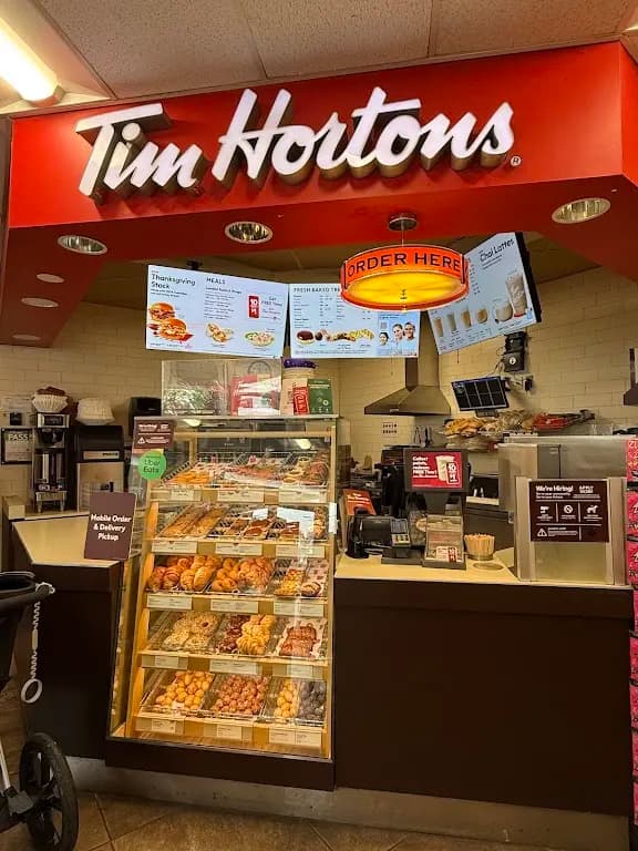 Tim Hortons storefront and interior at 3321 Dufferin St, Toronto, ON