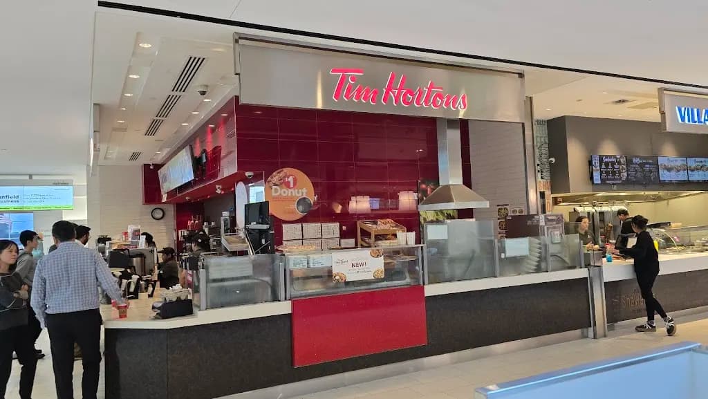 Tim Hortons storefront and interior at Waterpark Place, Toronto, ON