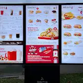 Tim Hortons storefront and interior at 1 Thornhill Woods Dr, Vaughan, ON