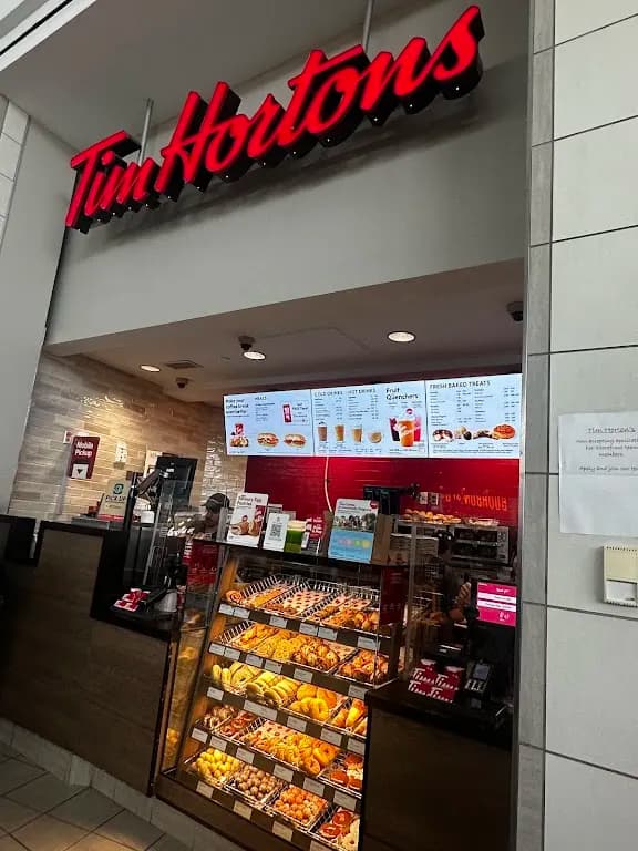 Tim Hortons storefront and interior at 550 King St North, Waterloo, ON