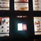Tim Hortons storefront and interior at 1601 Stellar Drive, Whitby, ON
