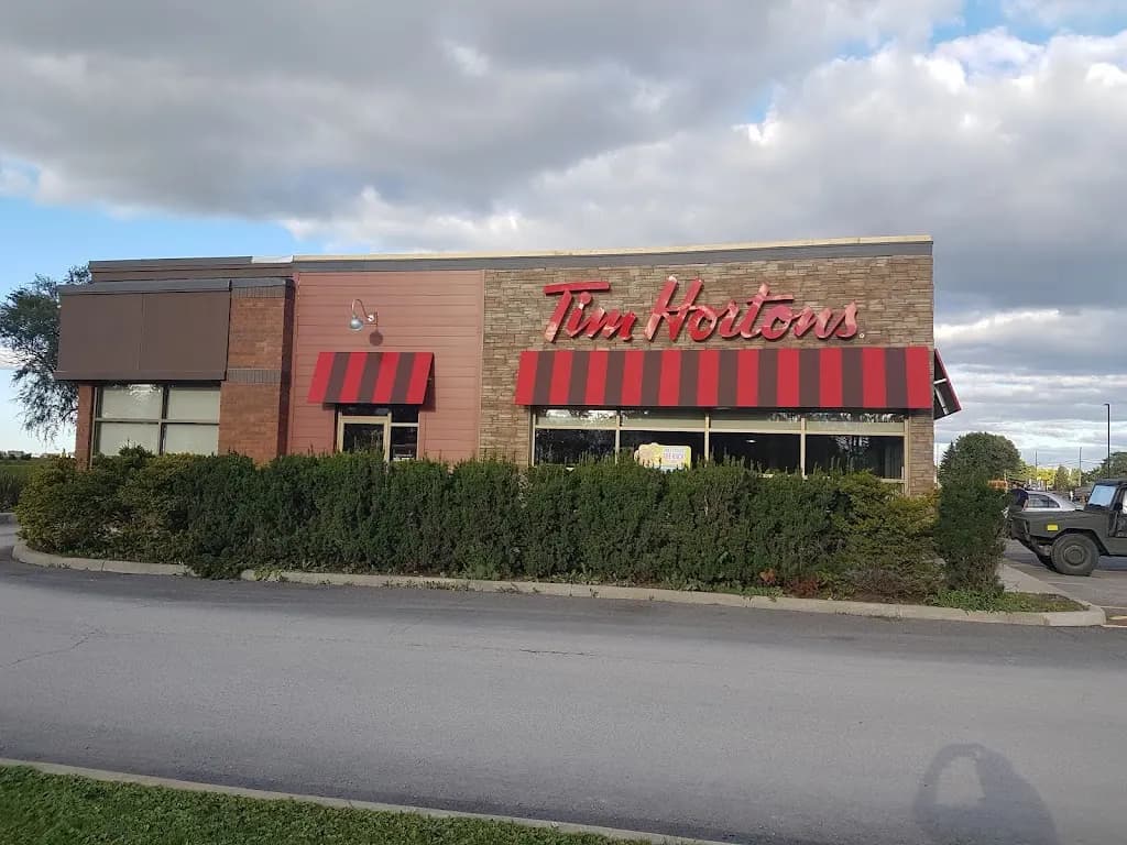 Tim Hortons storefront and interior at 12105 Main St, Winchester, ON