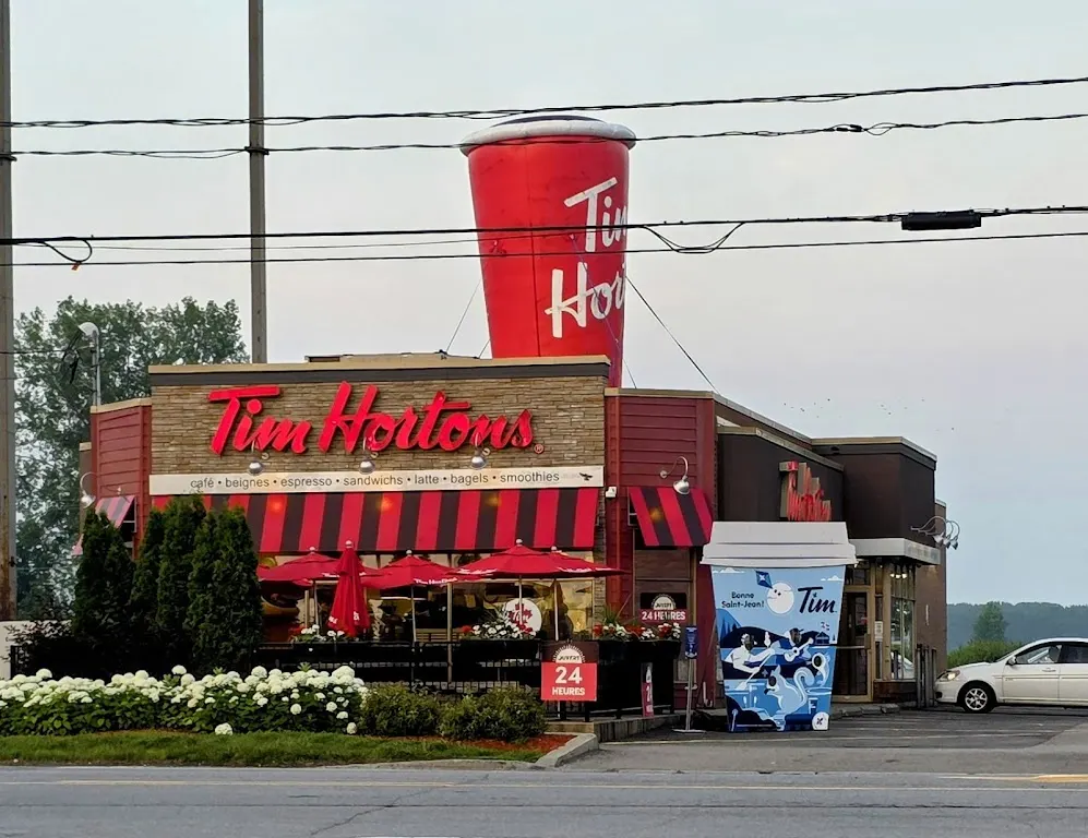 Tim Hortons storefront and interior at 1041 Av Gilles Villeneuve, Berthierville, QC