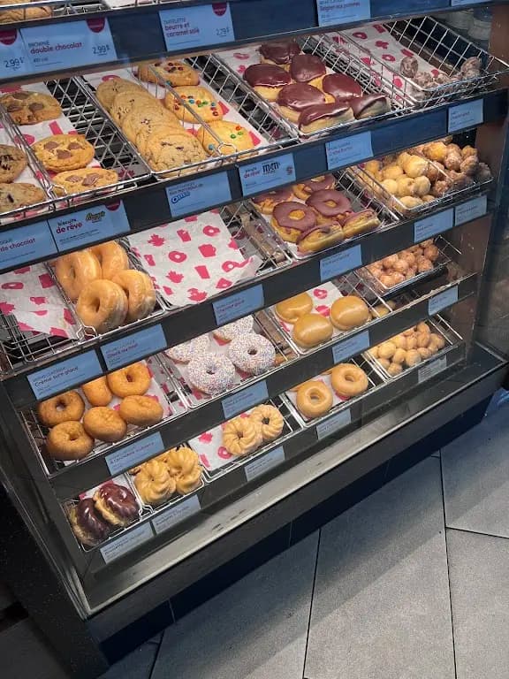 Tim Hortons storefront and interior at 7305, Boul. Grande-allee, Brossard, QC