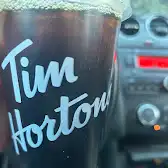 Tim Hortons storefront and interior at 237 Rue Main Est, Coaticook, QC
