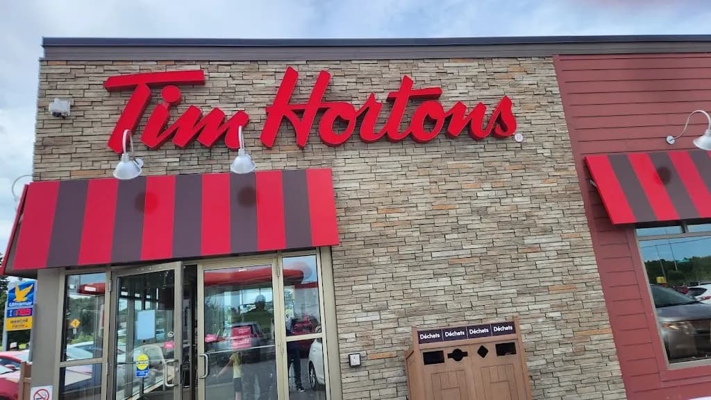 Tim Hortons storefront and interior at 1203 Rue De Rouyn, Granby, QC