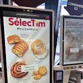 Tim Hortons storefront and interior at 625, Boul. Cure-labelle, Laval, QC