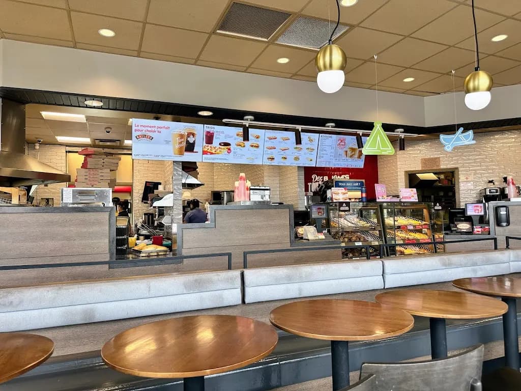 Tim Hortons storefront and interior at 825, Boul. Vanier, Laval, QC