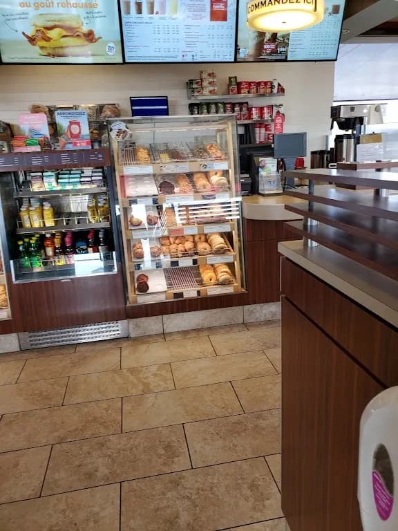 Tim Hortons storefront and interior at 4636 Boul Samson, Laval, QC