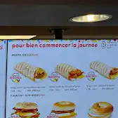 Tim Hortons storefront and interior at 4636 Boul Samson, Laval, QC