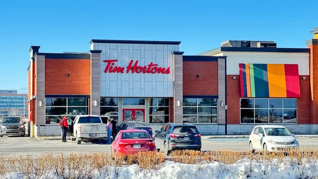 Tim Hortons storefront and interior at 5865 Rue Des Arpents, Levis, QC