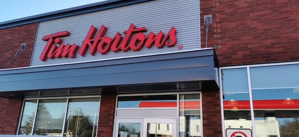 Tim Hortons storefront and interior at 1410 Route 201, Ormstown, QC