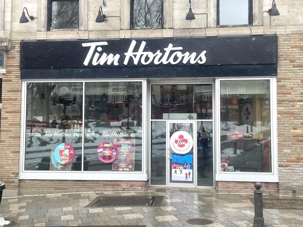 Tim Hortons storefront and interior at 4 - Côte De La Fabrique, Quebec, QC