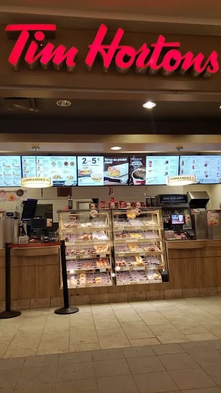 Tim Hortons storefront and interior at 552 Boul Wilfrid-hamel,, Quebec, QC