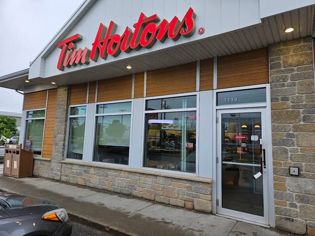 Tim Hortons storefront and interior at 2790 Boul De La Faune, Quebec, QC