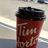 Tim Hortons storefront and interior at 3375, Boulevard Ste-anne, Quebec, QC