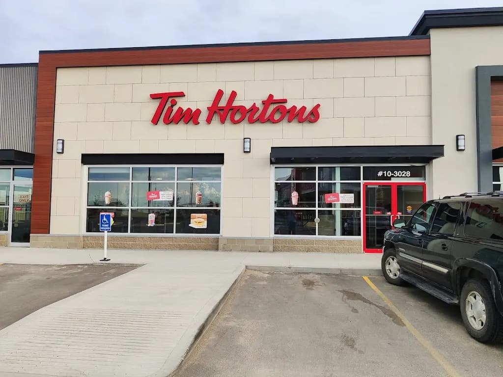 Tim Hortons storefront and interior at 10-3028 Meadows Parkway, Saskatoon, SK
