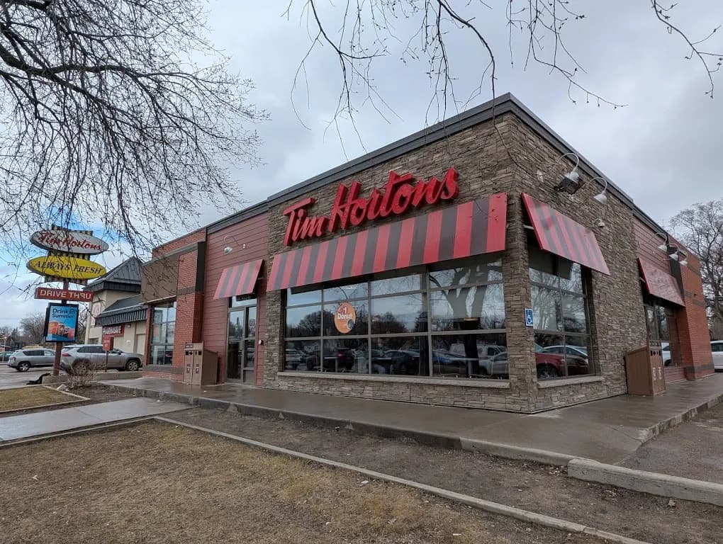 Tim Hortons storefront and interior at 16 33rd St E, Saskatoon, SK