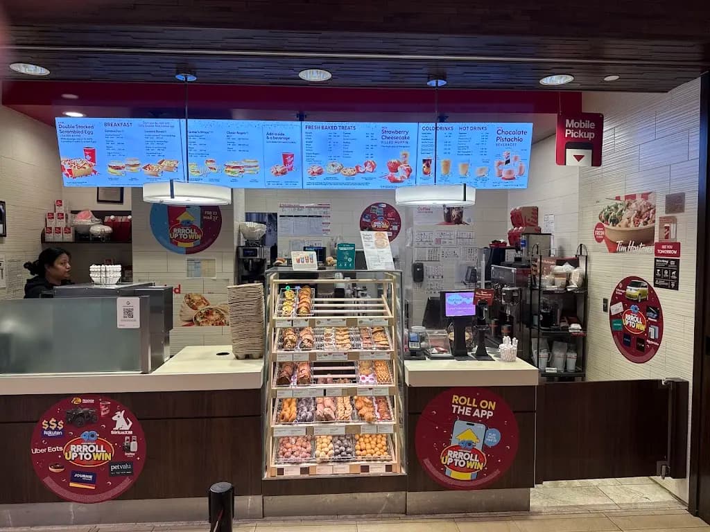 Tim Hortons storefront and interior at 201 1st Ave South, Saskatoon, SK