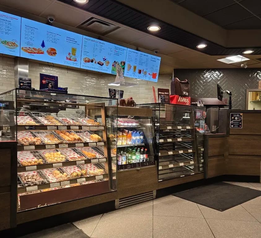 Tim Hortons storefront and interior at 709 Circle Dr East, Saskatoon, SK