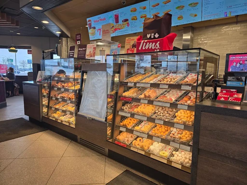 Tim Hortons storefront and interior at 810 Circle Dr E, Saskatoon, SK