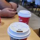Tim Hortons storefront and interior at 810 Circle Dr E, Saskatoon, SK
