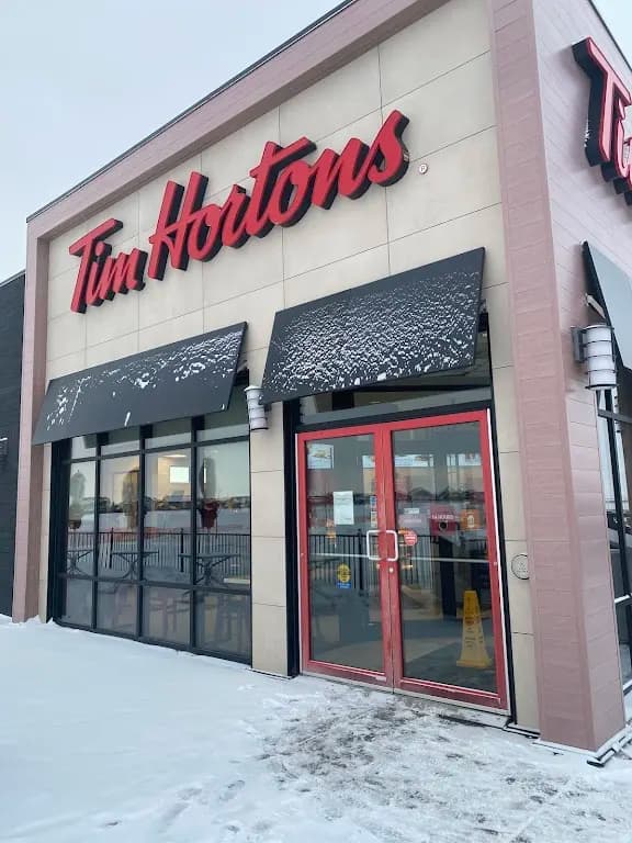 Tim Hortons storefront and interior at 2128 Mcclocklin Road, Saskatoon, SK