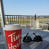 Tim Hortons storefront and interior at 2128 Mcclocklin Road, Saskatoon, SK
