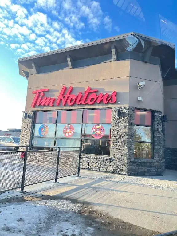 Tim Hortons storefront and interior at 3134 Clarence Ave S, Saskatoon, SK