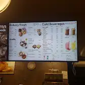 Tim Hortons storefront and interior at 3134 Clarence Ave S, Saskatoon, SK