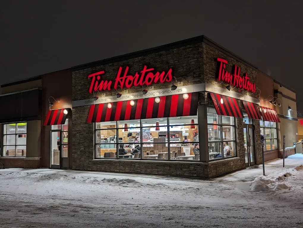 Tim Hortons storefront and interior at 3510 8th St E, Saskatoon, SK