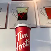 Tim Hortons storefront and interior at 200-930 Centenial Blvd, Warman, SK
